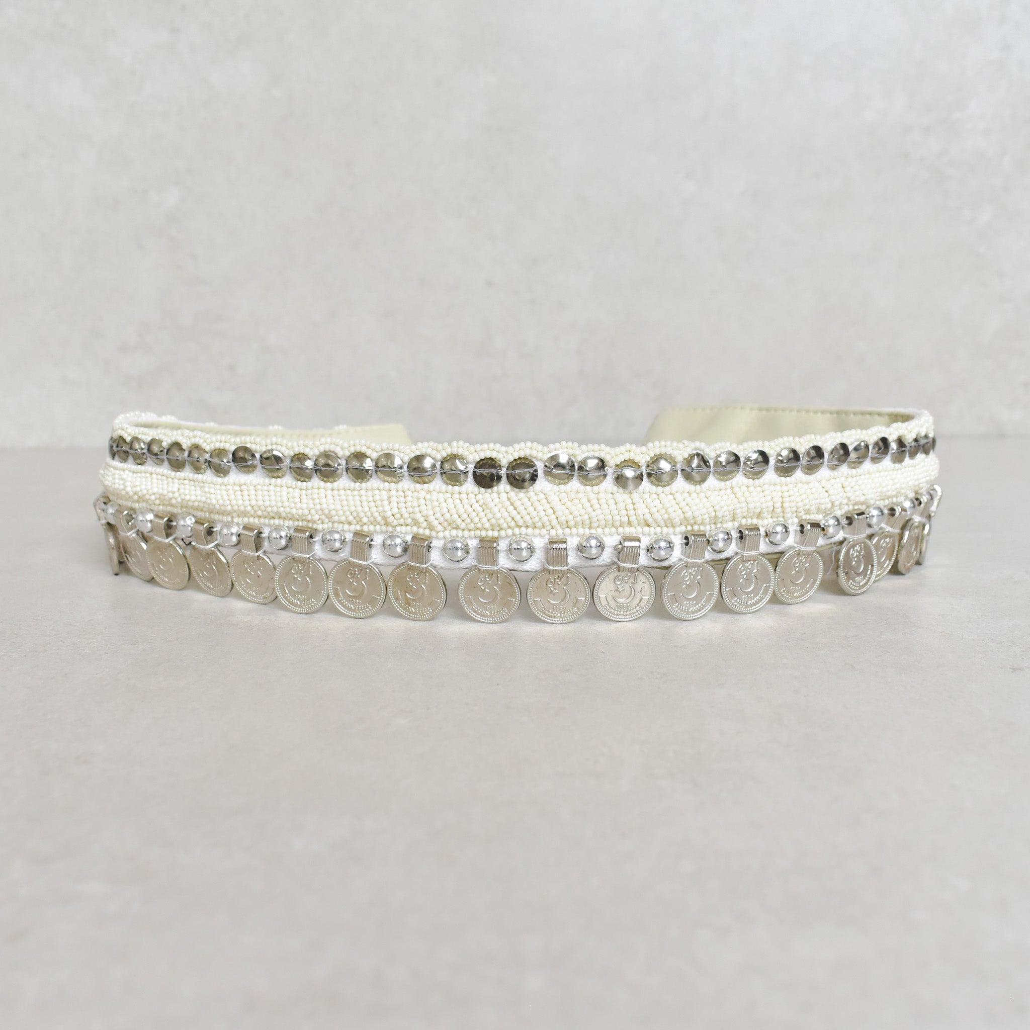Cinturón white coins
