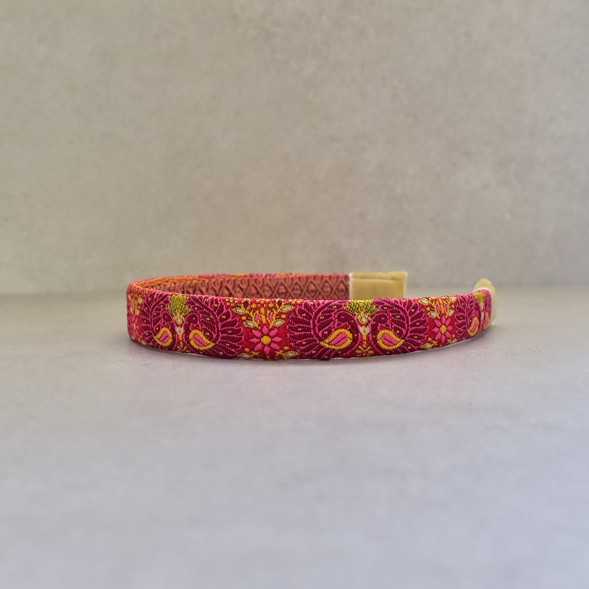 Cintillo Crimson Peacock red