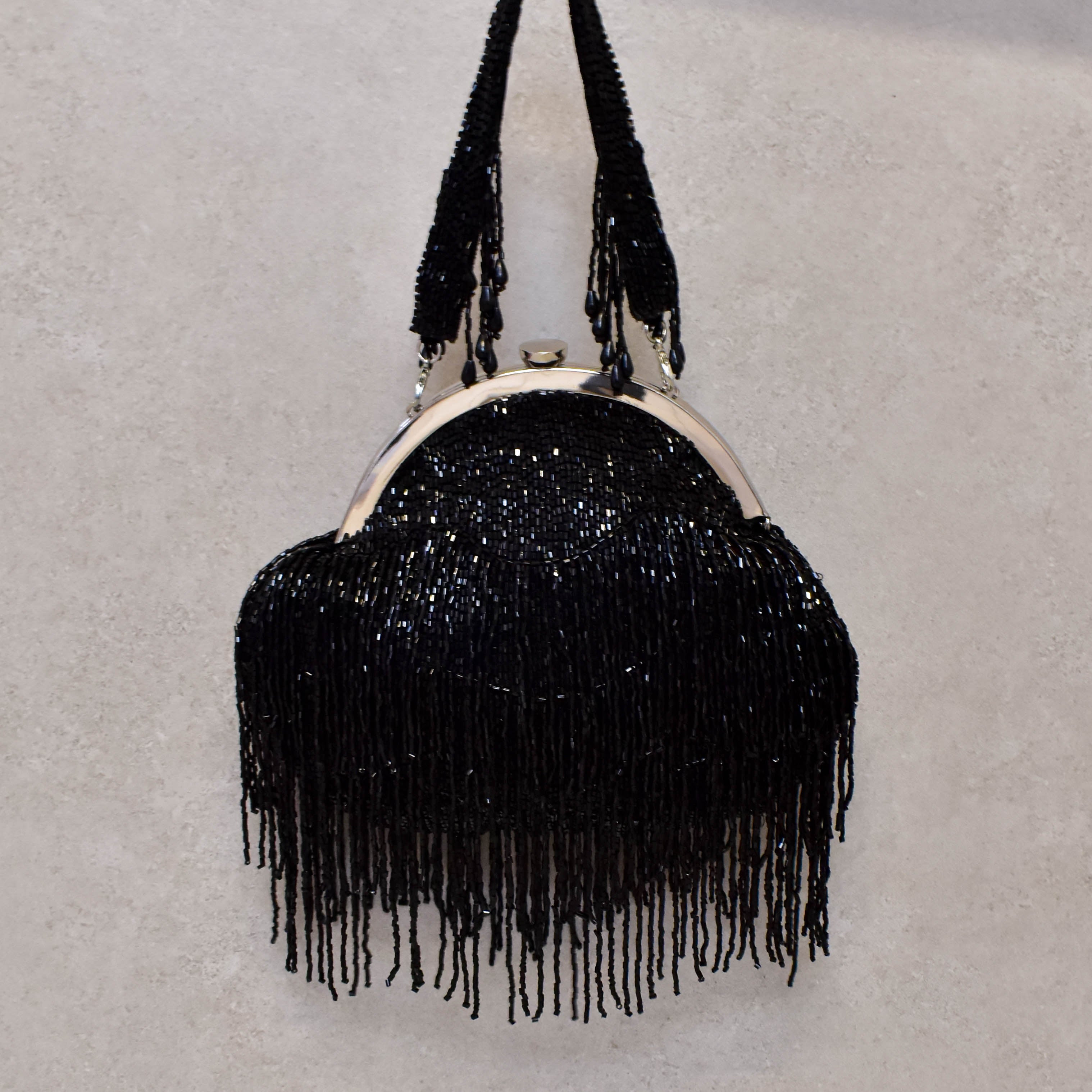 Cartera, Black Fringes