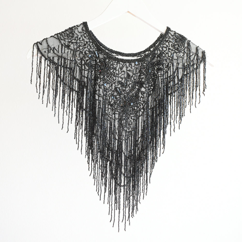Capa flecos, Back to Black