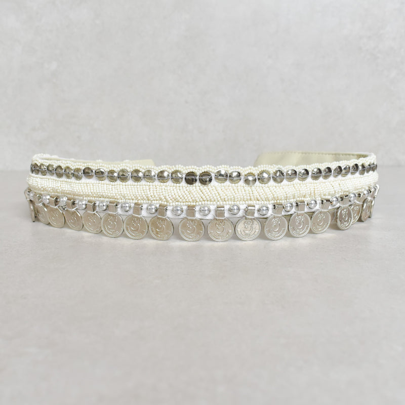 Cinturón white coins