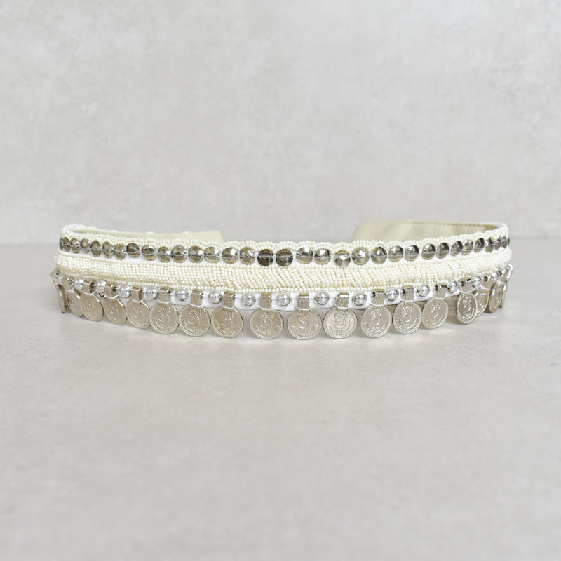 Cinturón white coins