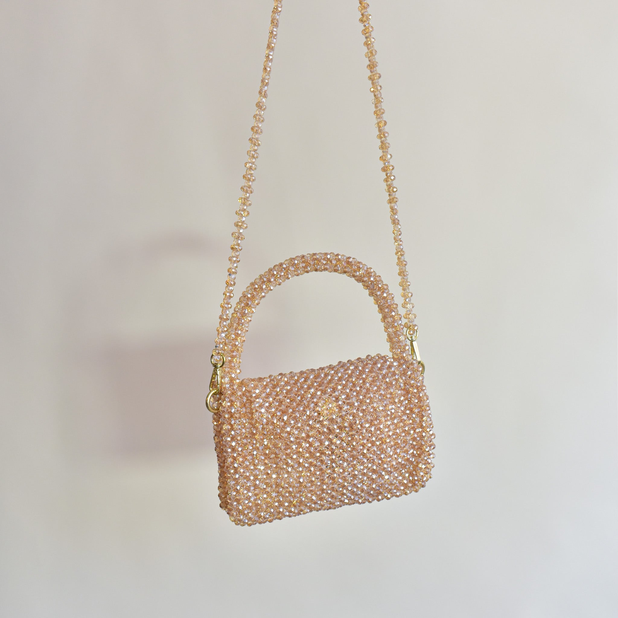 Cartera tejida en piedras "Timeless" gold