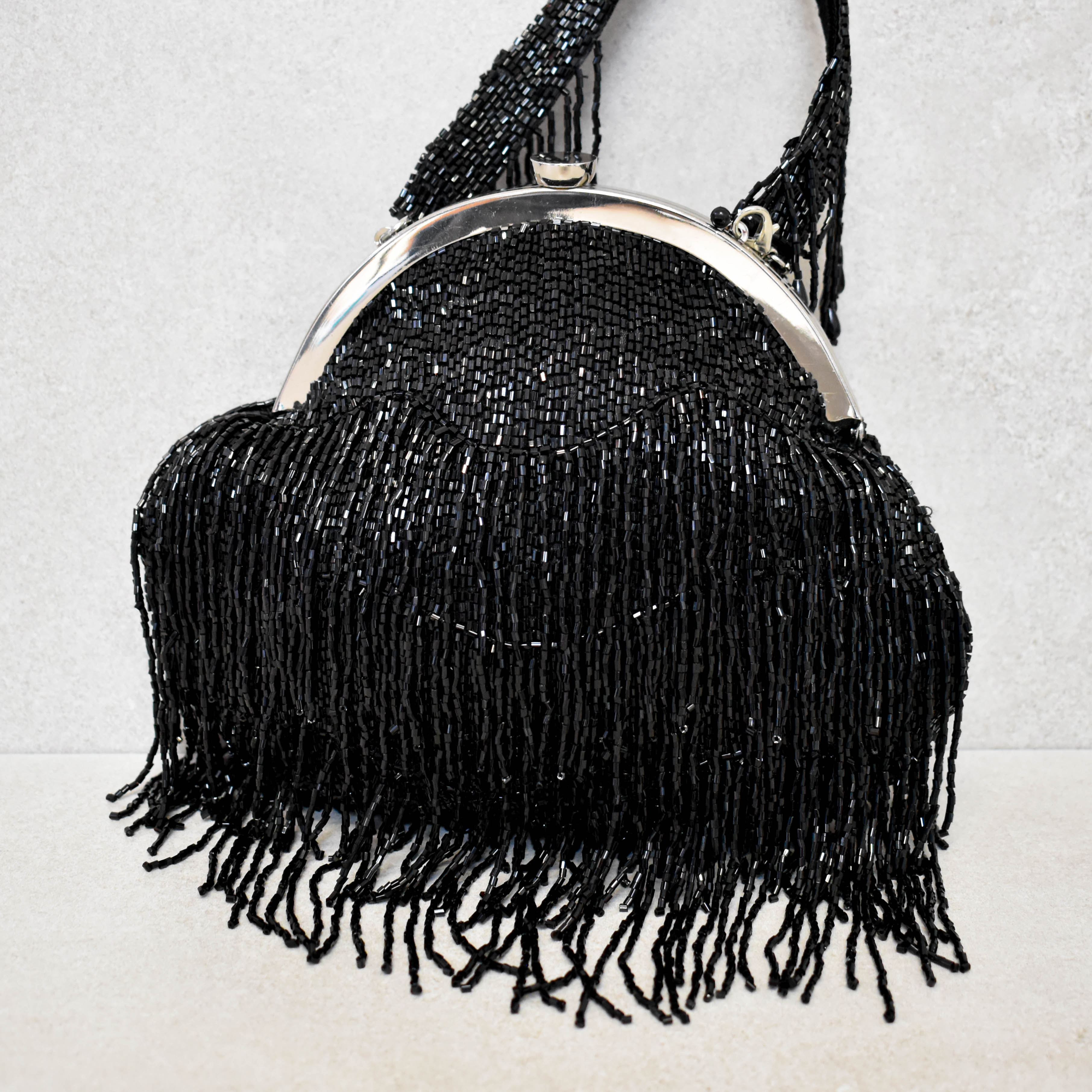 Cartera, Black Fringes