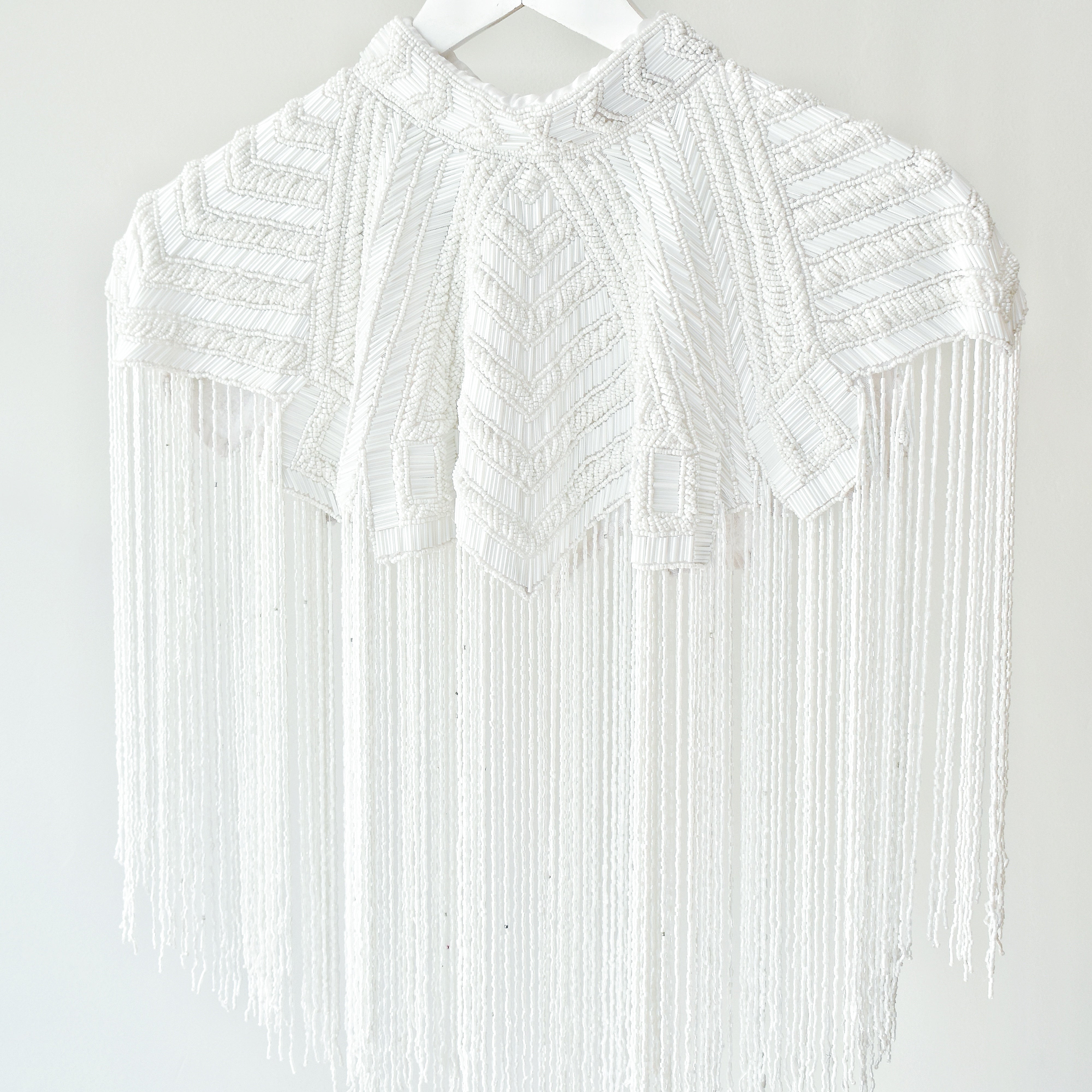 Capa Geometric Marfil