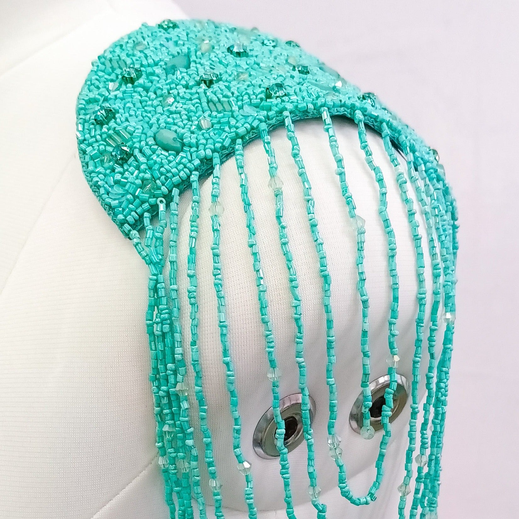 Hombreras bordadas, Who’s that Girl